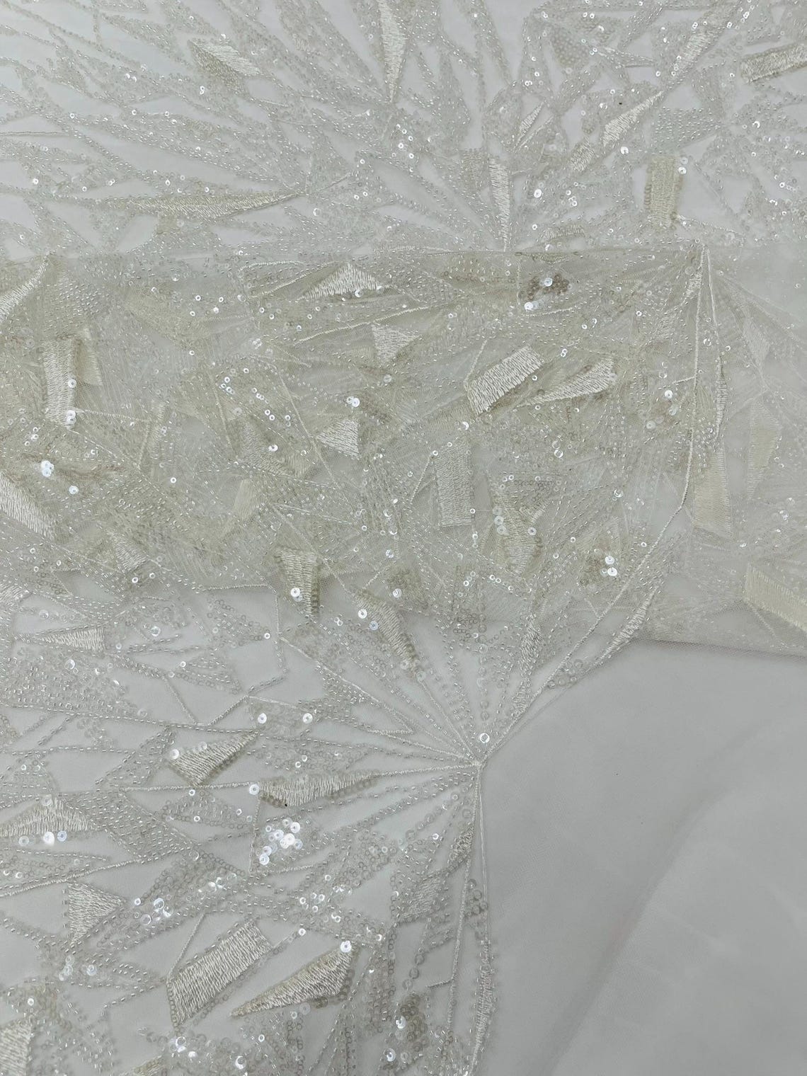 GEOMETRIC  - WHITE - Designs Embroider with Sequins and Heavy Beaded on a Mesh Lace Fabric - Sold By The Yard