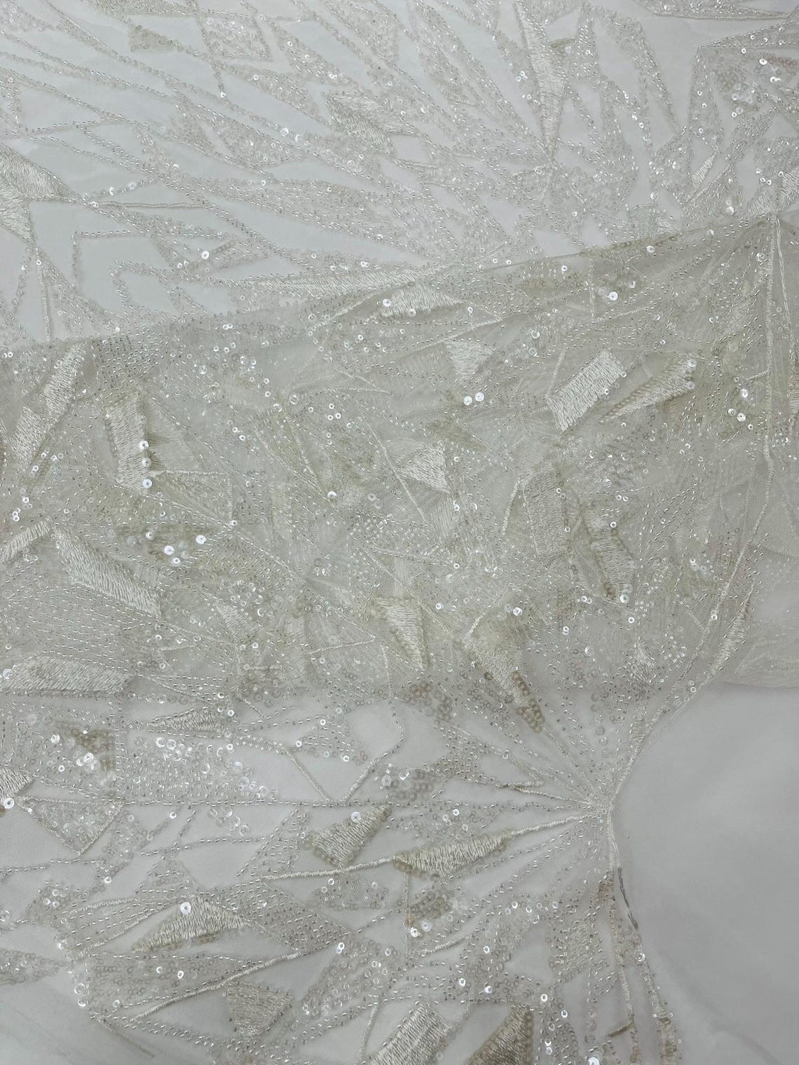 GEOMETRIC  -OFF WHITE - Designs Embroider with Sequins and Heavy Beaded on a Mesh Lace Fabric - Sold By The Yard