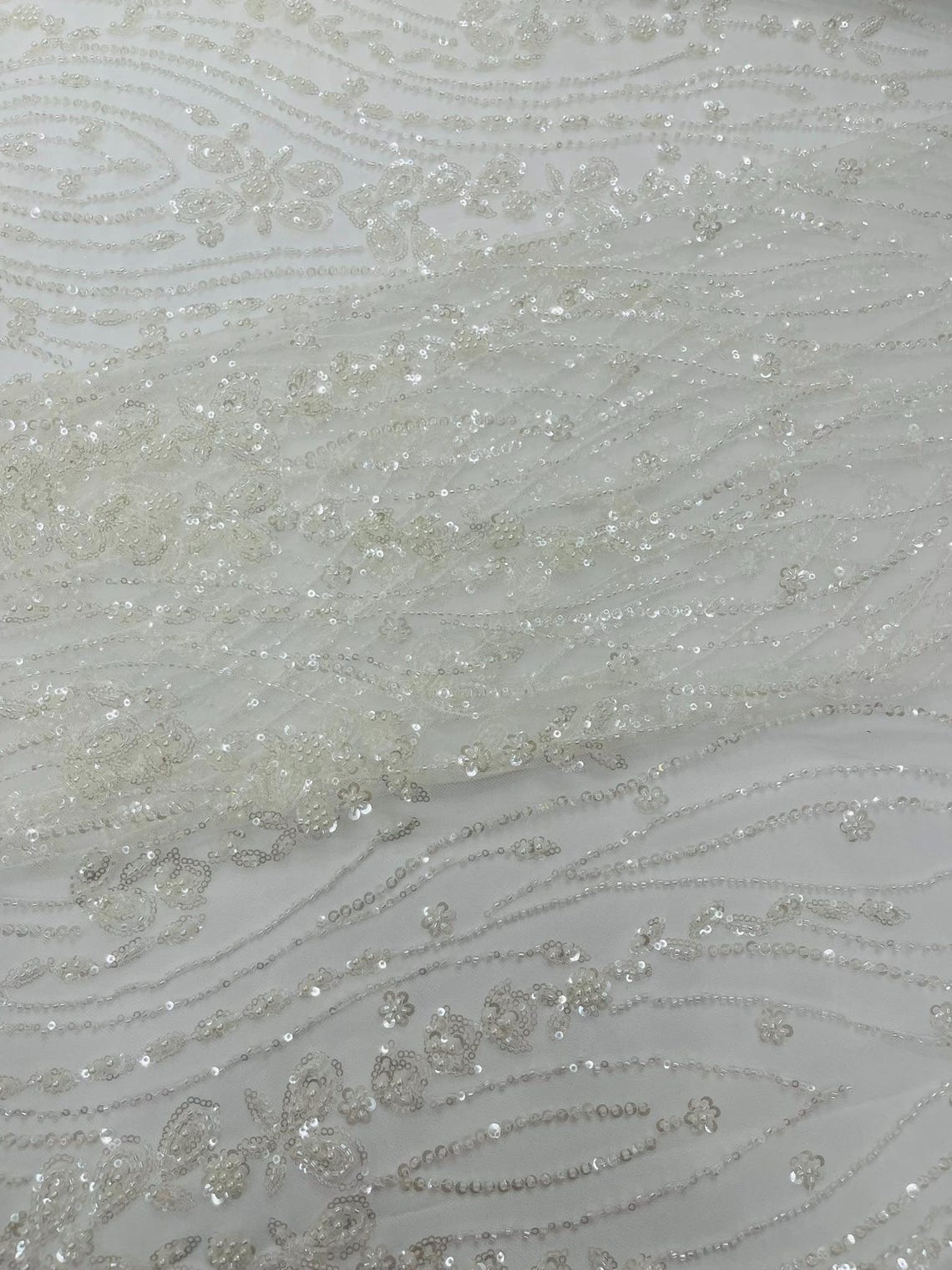 FEATHER  - IVORY - Designs Embroider with Sequins and Heavy Beaded on a Mesh Lace Fabric - Sold By The Yard