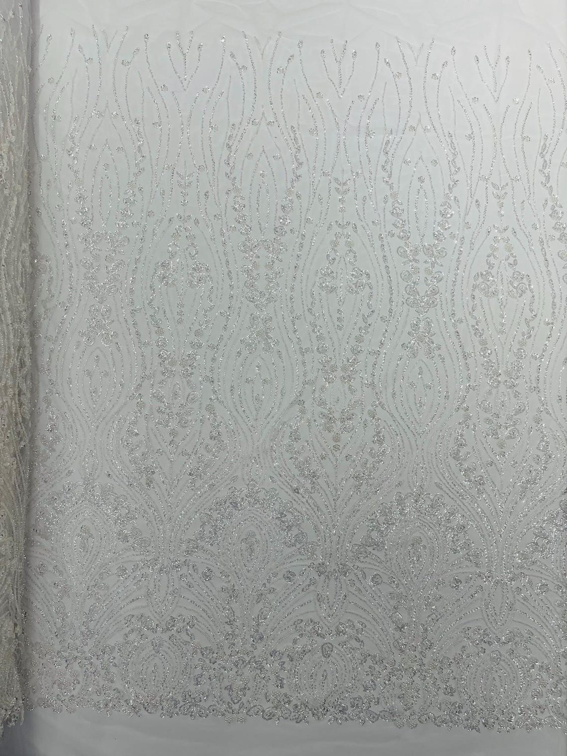 FEATHER  - WHITE - Designs Embroider with Sequins and Heavy Beaded on a Mesh Lace Fabric - Sold By The Yard