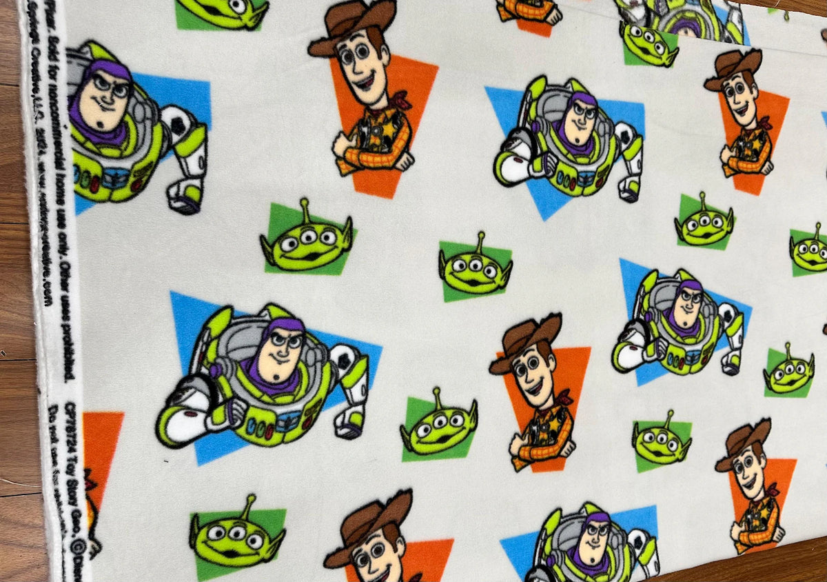 Toy Story Fleece Fabric by the Yard – Woody, Buzz Lightyear & Alien Print – Soft Disney Pixar Material